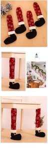 Close-up of snowflake pattern chair leg covers in Christmas elf boot design with fur trim