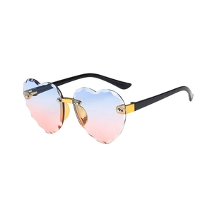 Frameless heart-shaped sunglasses with blue-pink gradient lenses and wavy cut edges