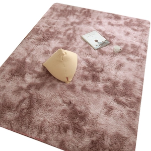 Soft pink tie-dye shaggy rug for living room with cozy plush texture and home decor setup