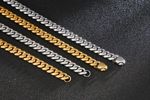 Detailed view of 8mm gold and silver polished stainless steel Cuban link chains for men