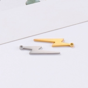 Detailed view of lightning bolt charms in gold and silver finish for DIY jewelry