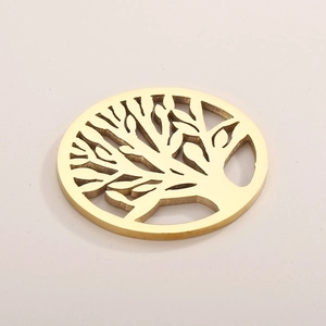 Detailed view of a golden stainless steel tree of life pendant with intricate cutouts