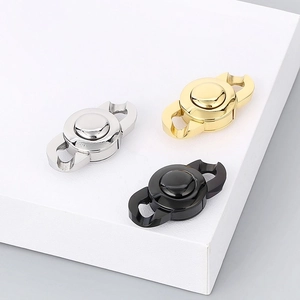 Detailed view of silver, gold, and black magnetic jewelry clasps for DIY chain making