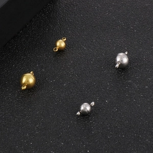 Detail showing gold and silver magnetic sphere clasps for DIY jewelry making