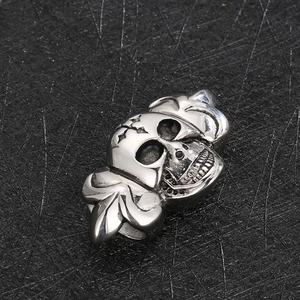 Macro shot of silver punk skull bead with detailed engravings for DIY leather bracelets