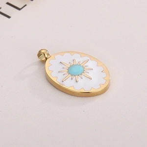 Elegant gold oval pendant with white enamel and blue sunburst design for DIY jewelry