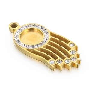 Macro shot of gold pendant base with zircon rhinestone frame for DIY jewelry making