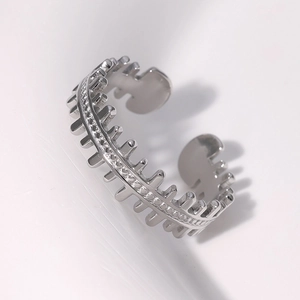 Minimalist silver steel open ring with industrial gear edges and beaded texture detail