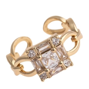 Vintage gold copper ring with zircon stones featuring a chain-style open band design