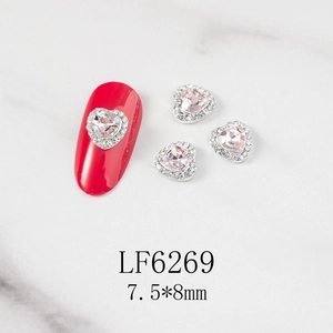 Pink heart-shaped nail art crystal with silver rhinestones, size 7.5x8mm, for manicure decor