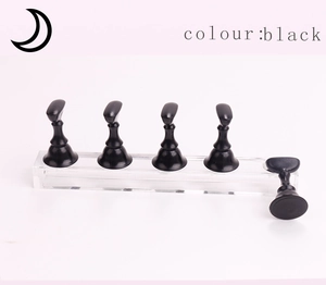 Detail view of five black magnetic nail art stands with clear acrylic practice base