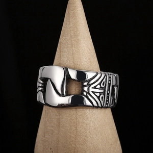 Vintage oxidized titanium steel chain ring for men featuring a hollow portrait design