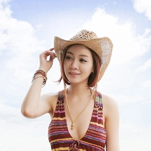 Women's hollow-out straw cowboy hat with wide brim for summer sun protection in outdoor sun