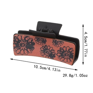Detail view of floral western sunflower hair claw clip with size and weight dimensions