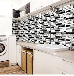 Detail of PVC self-adhesive marble wall stickers in black, white and gold mosaic pattern