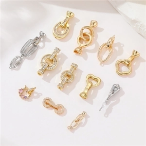 Assorted 14K gold plated pearl necklace clasps in various shapes with zircon inlay