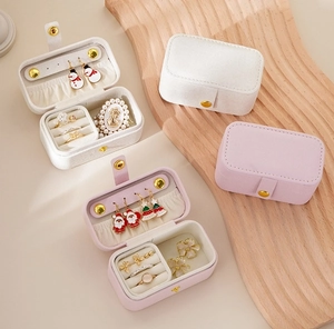 Detail view of mini PU leather jewelry boxes with earring slots and elastic pockets