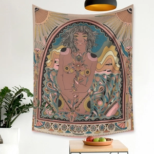 Detail of bohemian tapestry featuring floral elements and sun motifs in a cozy room setting