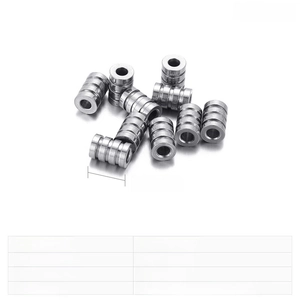 Detail of 10x6mm stainless steel cylindrical spacers with groove for jewelry making