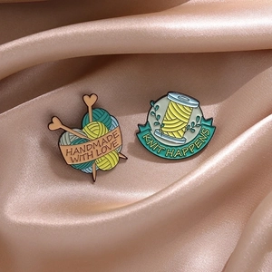 Cartoon enamel cat yarn pins with Handmade With Love and Knit Happens text on silk