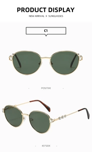 Détail de lunettes de soleil ovales en métal doré avec verres olive et strass chic