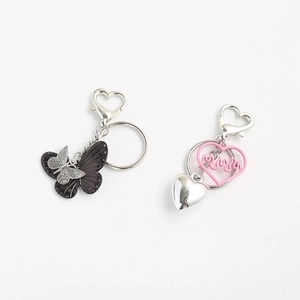 Cool heart and butterfly metal keychains set in silver, pink and black finish
