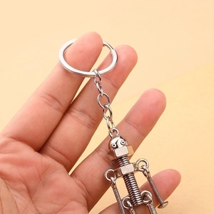 Handheld vintage handmade robot keychain made of silver metal screws and nuts