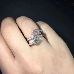 Double layer open ring with pear shaped pink and yellow-green stones and tiny diamonds