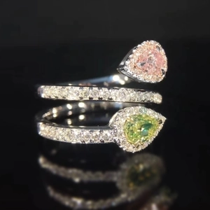 Luxurious silver snake open ring featuring pink and yellow pear-cut crystals and pavé diamonds