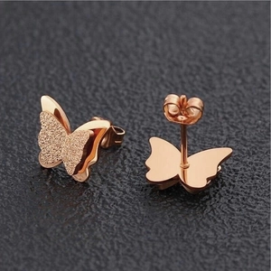 3D butterfly stud earrings in rose gold with matte and polished dual-layered wings