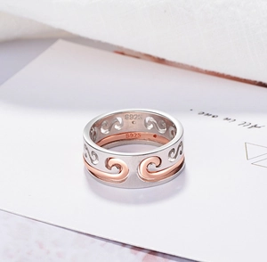 Macro view of S925 sterling silver hallmarked ring with rose gold hollow cloud pattern