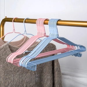 Non-slip stainless steel clothes hangers in pink and blue for wet and dry garment use