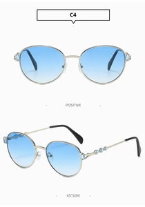 Détails de lunettes de soleil ovales en métal avec verres dégradés bleus et strass