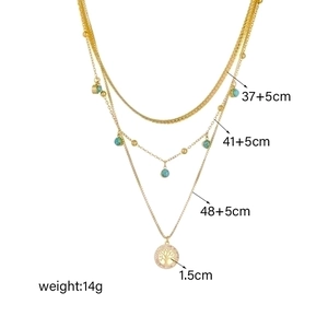 Layered gold tree of life necklace with turquoise beads and adjustable chain lengths