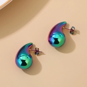 Detailed view of teardrop hollow earrings with iridescent aurora gradient finish