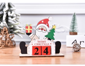 Close-up of wooden Santa countdown calendar with red numbered blocks and gift detail