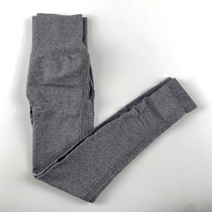Detailed view of high-waisted seamless marl grey yoga leggings with ribbing