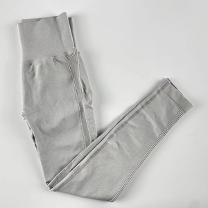 Detail of high-waisted seamless yoga pants with wide ribbed waistband in grey heather