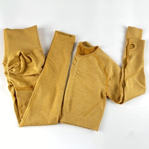 Close-up of seamless ginger yoga set with ruched butt lifting leggings and thumb hole sleeves
