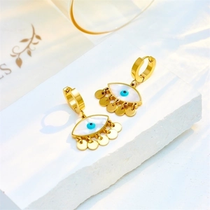 Golden titanium steel evil eye hoop earrings with mother of pearl and tassel charms
