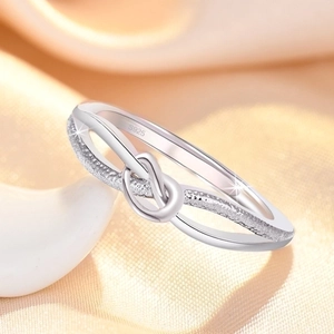 Elegant S925 sterling silver knot ring featuring polished and frosted dual-band design