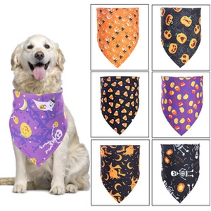 Detail of Halloween pet bandanas featuring colorful pumpkin and ghost patterns for dogs