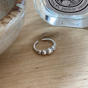 Detailed view of S925 sterling silver bubble open ring showing authentic hallmark stamp