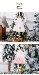 Detail of plush Christmas angel pendants in white and pink with glitter sequins and fur