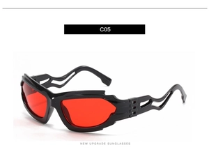 Detail view of black futuristic sports sunglasses with red lenses and hollow side temples