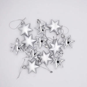 Set of 4.5cm silver 3D star ornaments for Christmas tree decoration on white background