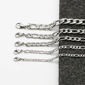 Polished silver Figaro link necklaces for men and women in various widths on stone base