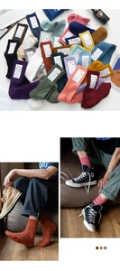 Detailed texture of cotton ribbed crew socks in multiple vintage colors and soft fabric