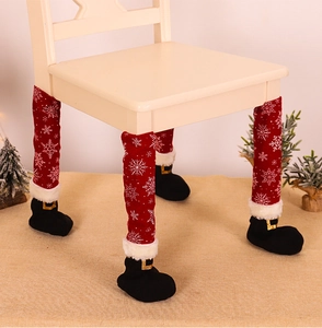 Detail showing Christmas chair leg covers with snowflake print and red fabric