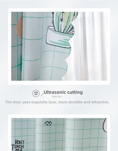 Detail showing ultrasonic scalloped edge and cactus print on green plaid fabric curtain